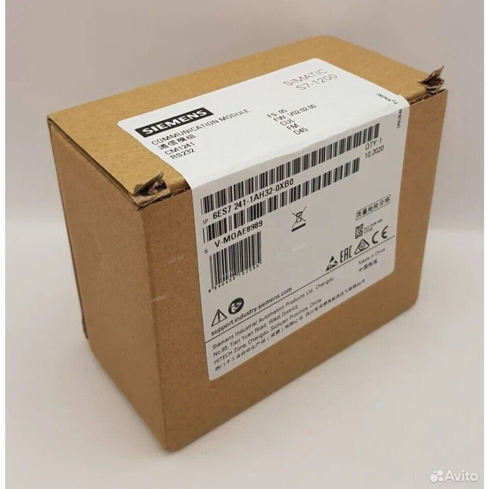 SIMATIC S7-1200 CM1241 Communication Module in brown cardboard box, industrial automation.
