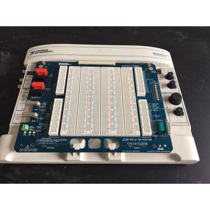 NI ELVIS II+ test system with breadboards, connectors, and function generator, for education and industrial automation.