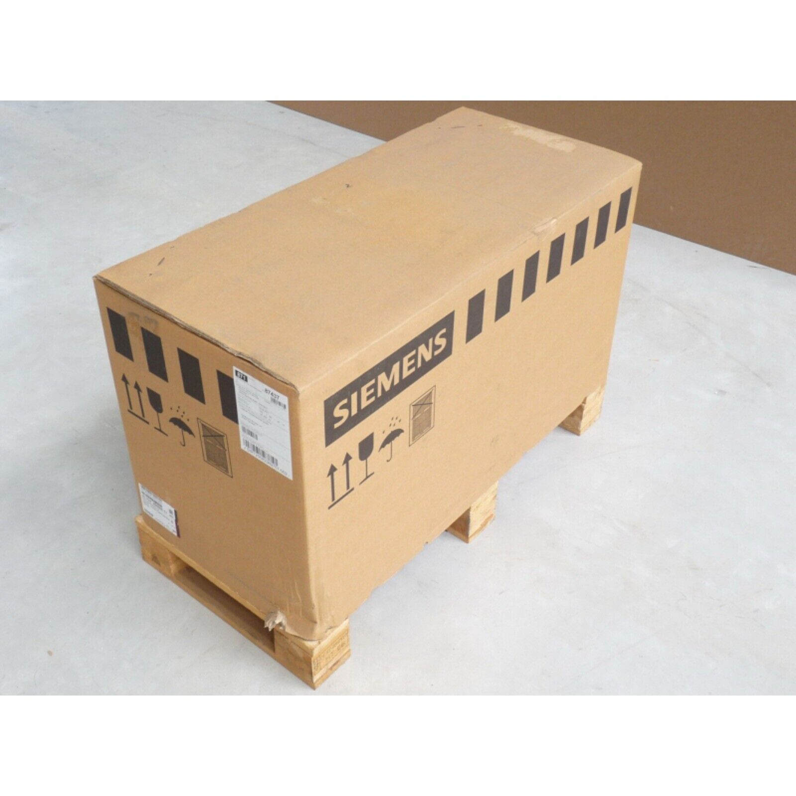 Siemens industrial automation equipment in shipping box on pallet