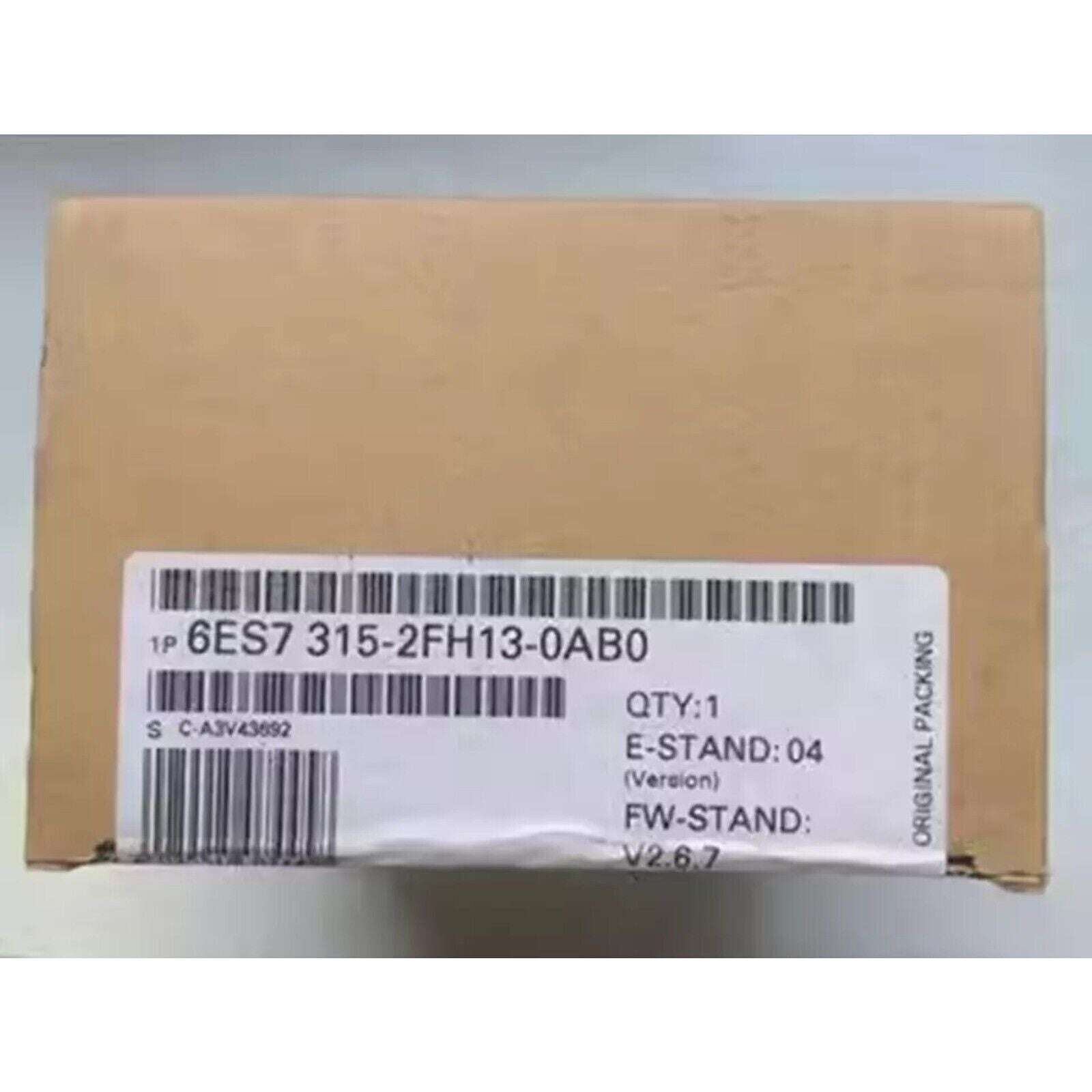 Siemens SIMATIC S7-300 PLC 6ES7 315-2FH13-0AB0 in original packaging. Industrial automation part with version information.