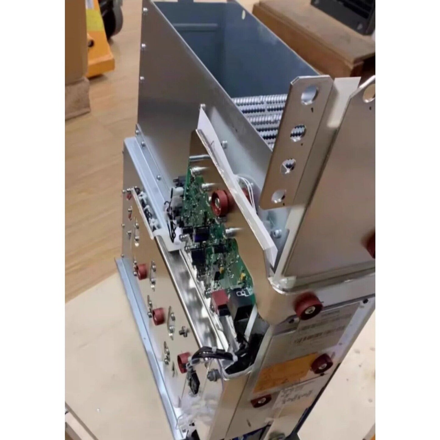 Siemens PLC component with circuit boards and metal housing, industrial automation part.