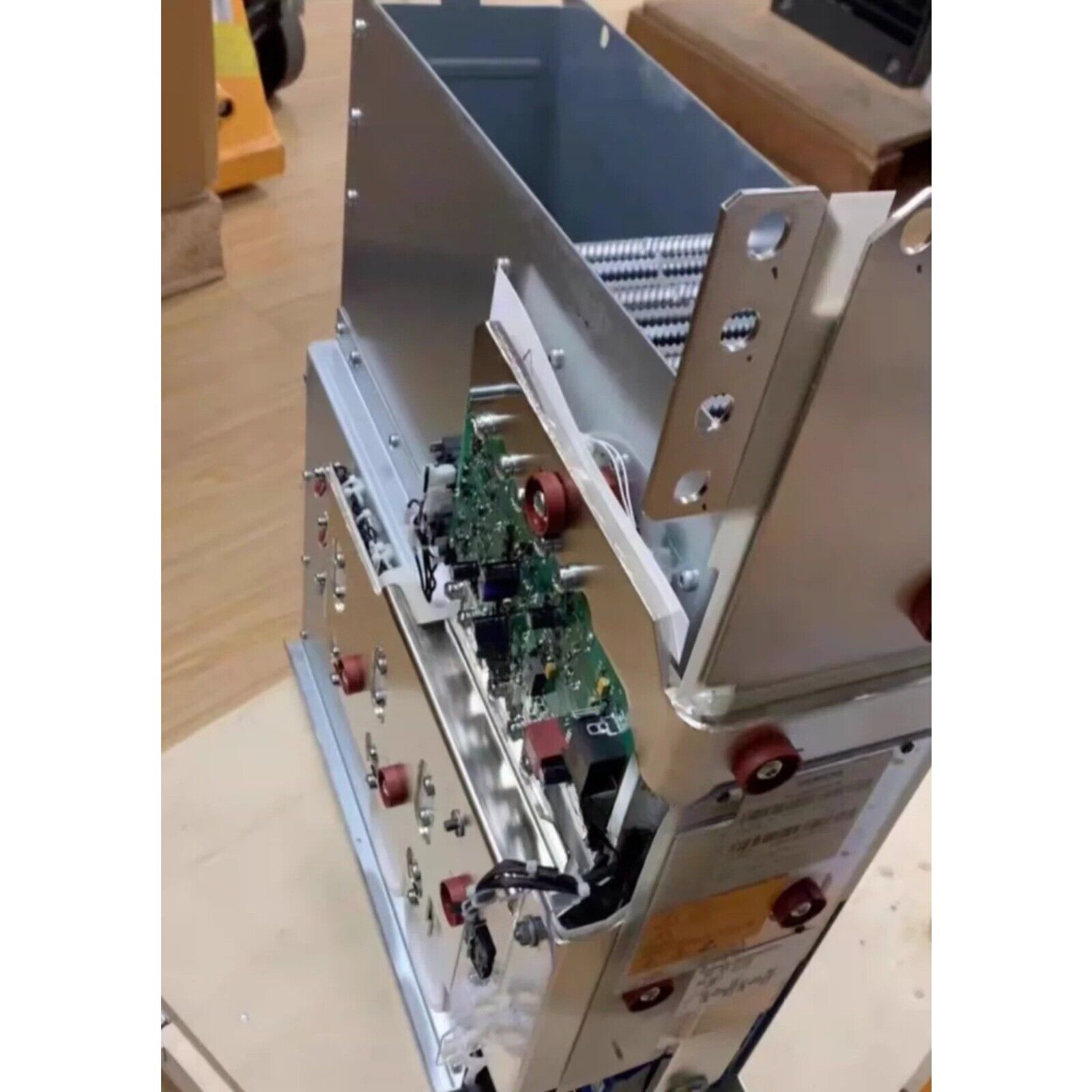 Siemens PLC component with circuit boards and metal housing, industrial automation part.