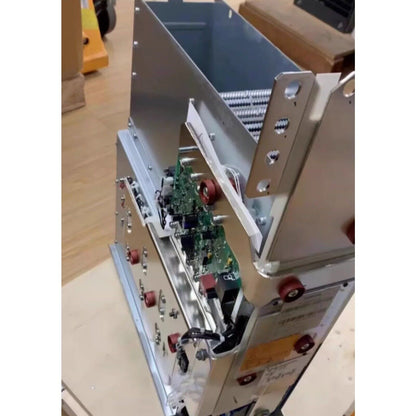 Siemens PLC component with circuit boards and metal housing, industrial automation part.