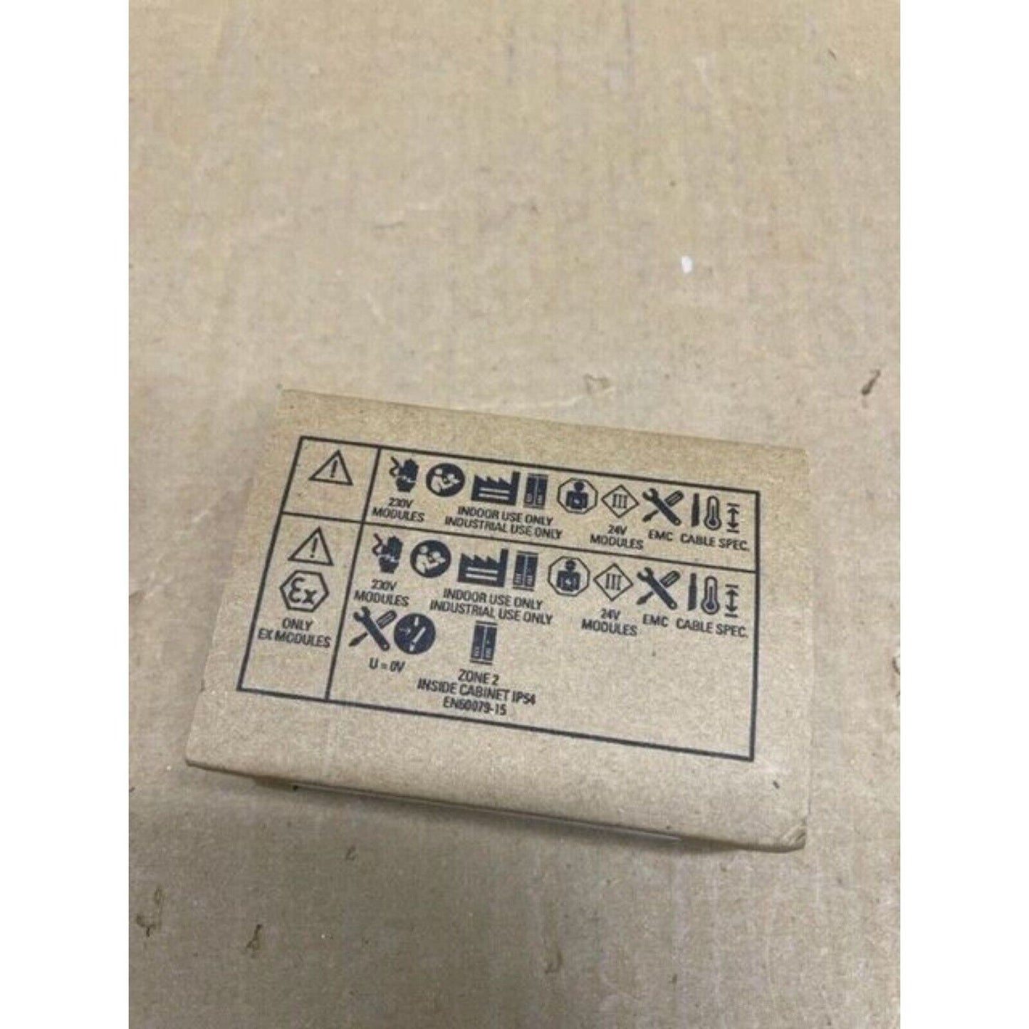 Siemens industrial automation module package with warning symbols and specifications, for PLC systems.