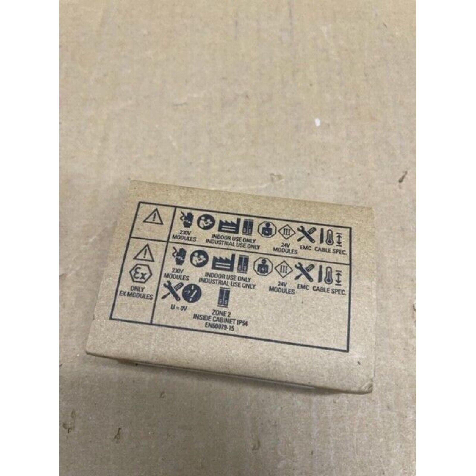 Siemens industrial automation module package with warning symbols and specifications, for PLC systems.