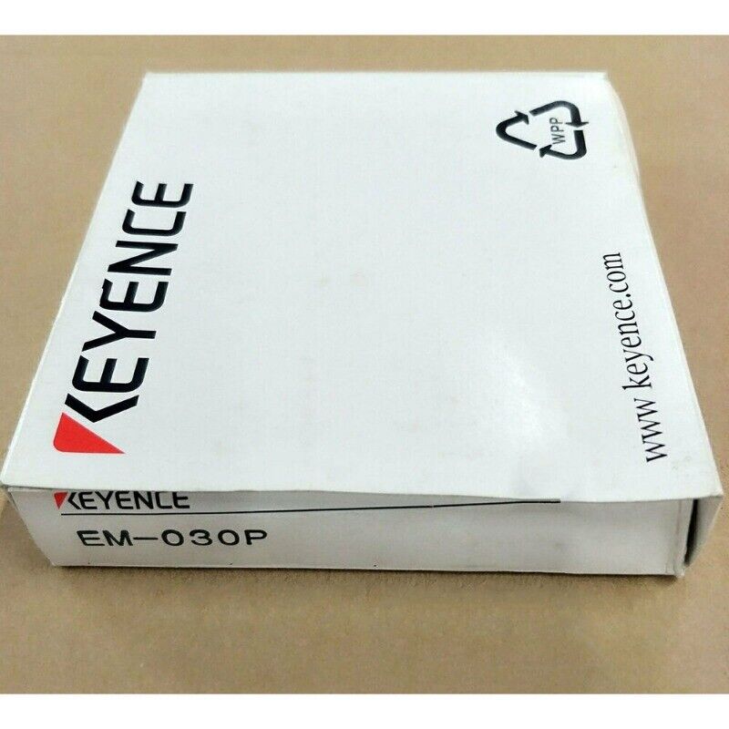 Keyence EM-030P Proximity Sensor Switch in Box. White box with brand logo and product information. www.keyence.com printed.