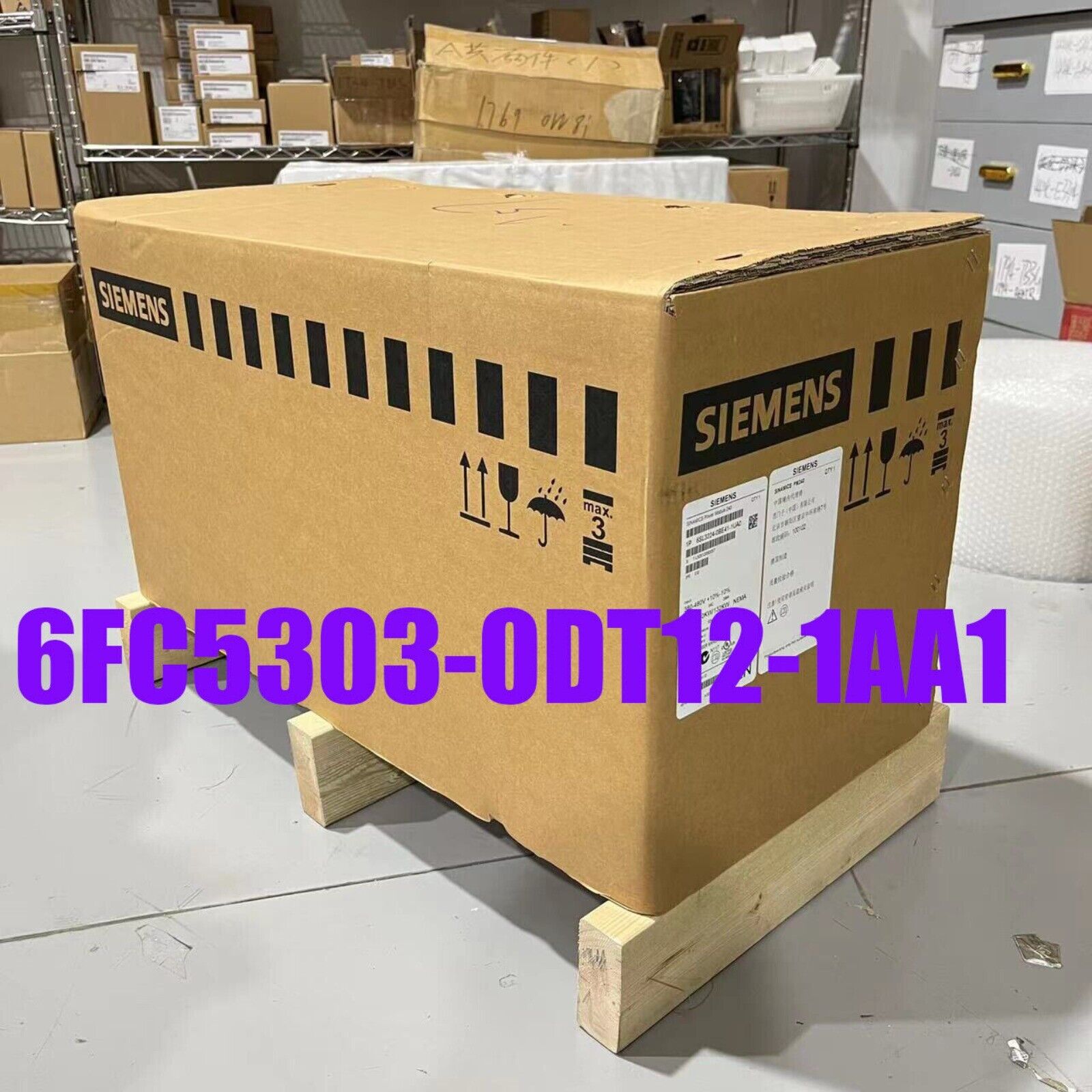 Siemens 6FC5303-0DT12-1AA1 CNC control panel box on wooden pallet, industrial automation parts.