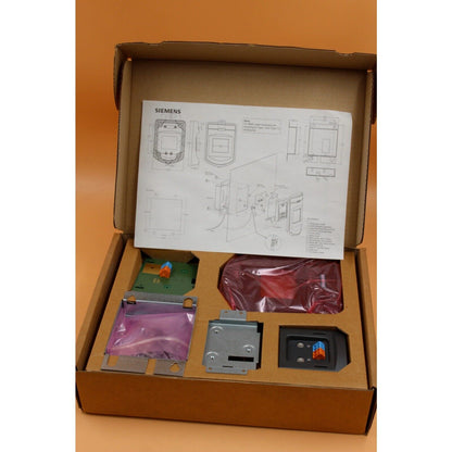 Siemens 6SE6400-0PM00-0AA0 door mounting kit components in box, industrial automation parts