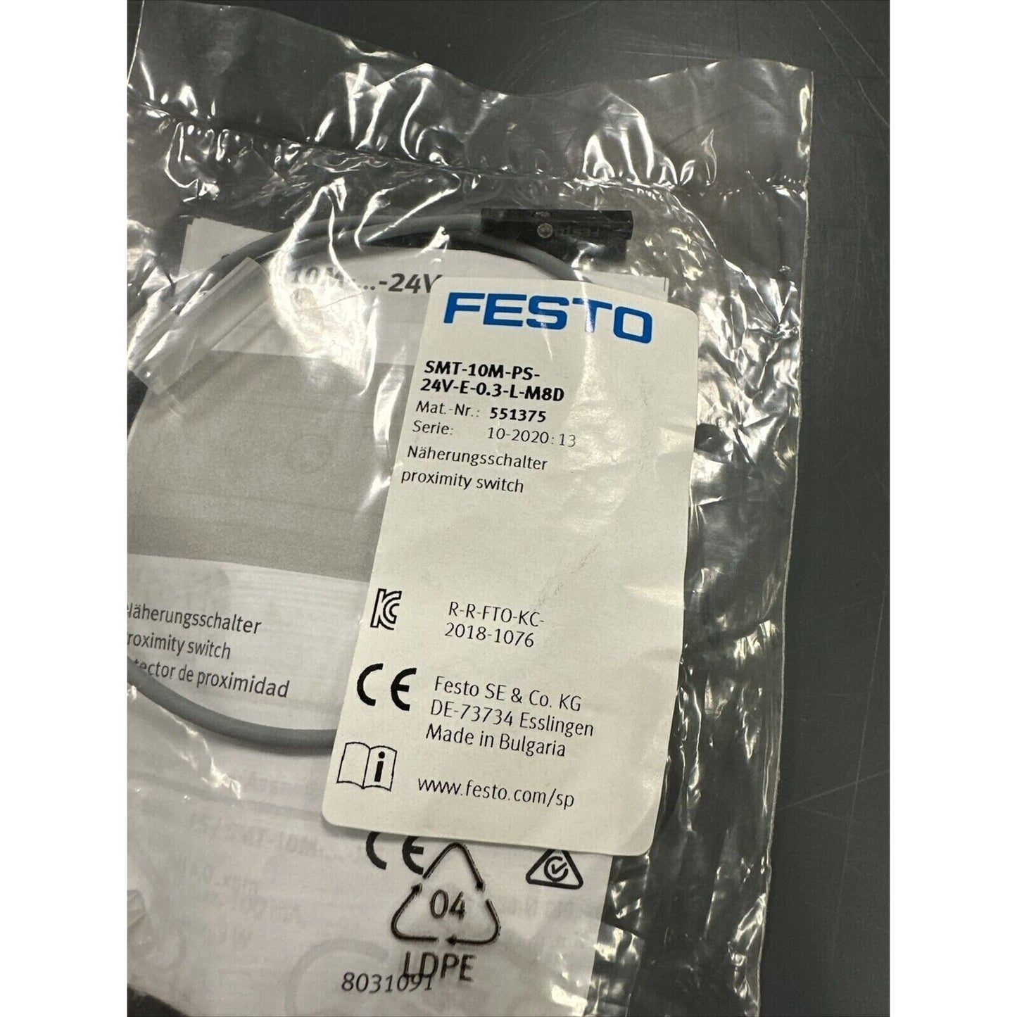 FESTO SMT-10M-PS-24V proximity sensor in packaging, industrial automation part, model number 551375.