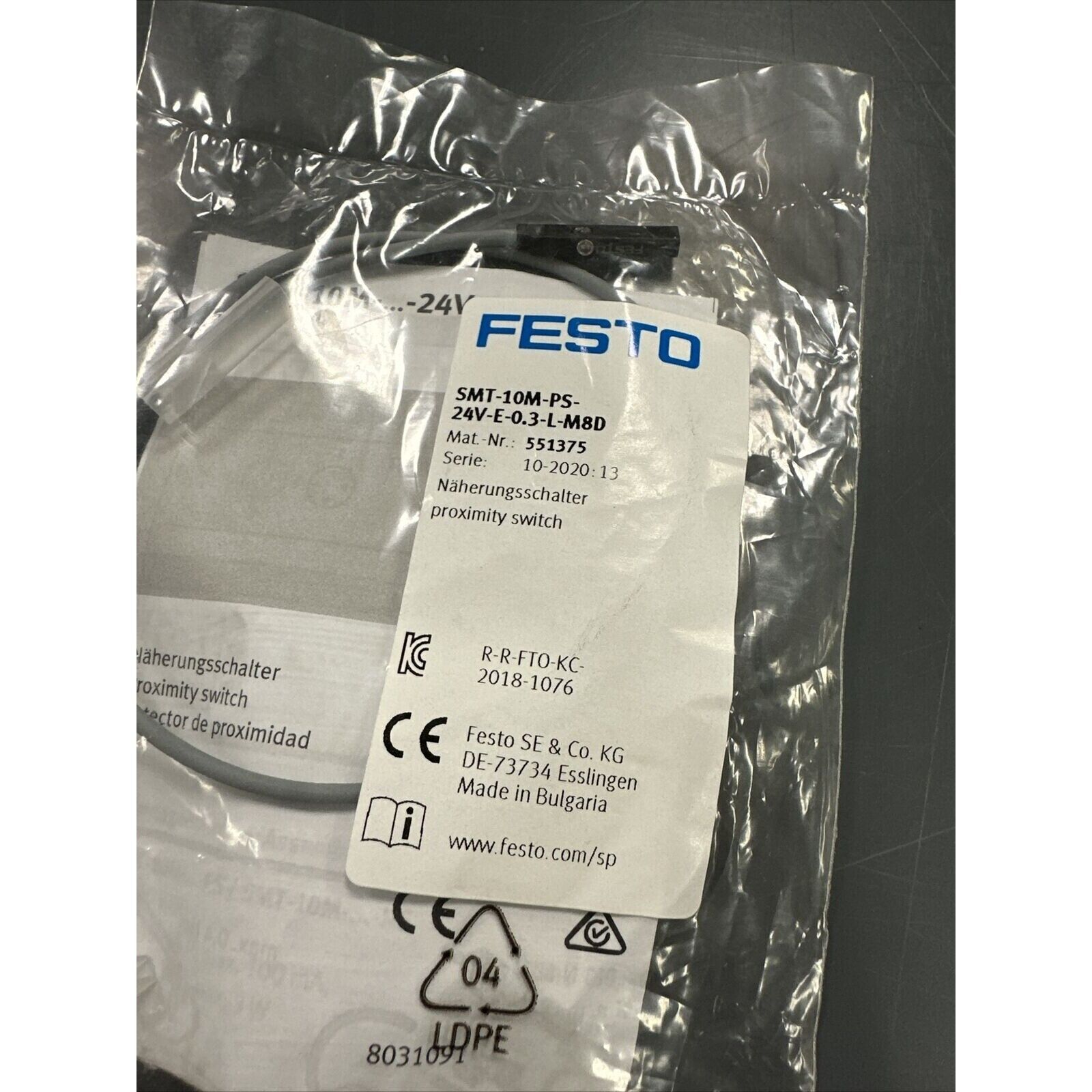 FESTO SMT-10M-PS-24V proximity sensor in packaging, industrial automation part, model number 551375.