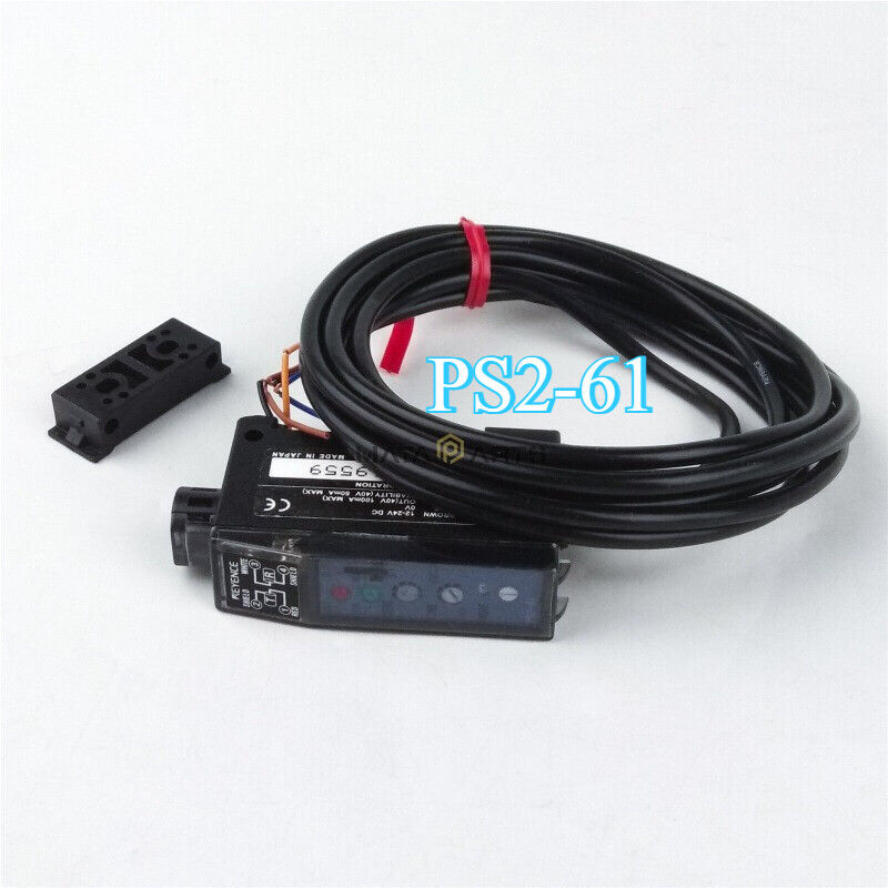 Keyence PS2-61 photoelectric sensor with cable and mounting bracket. Industrial automation sensor.