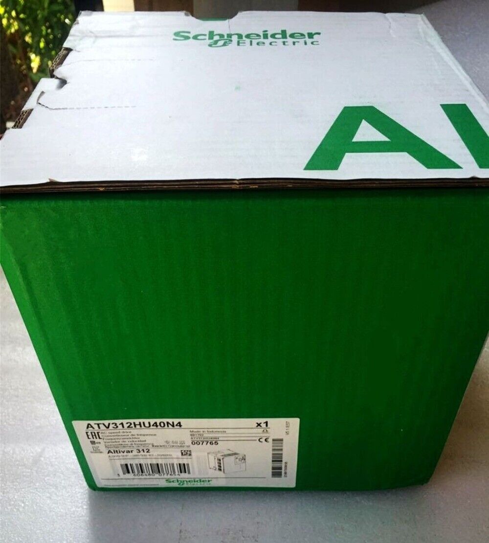 Schneider ATV312HU40N4 inverter in a green and white box, new industrial automation equipment