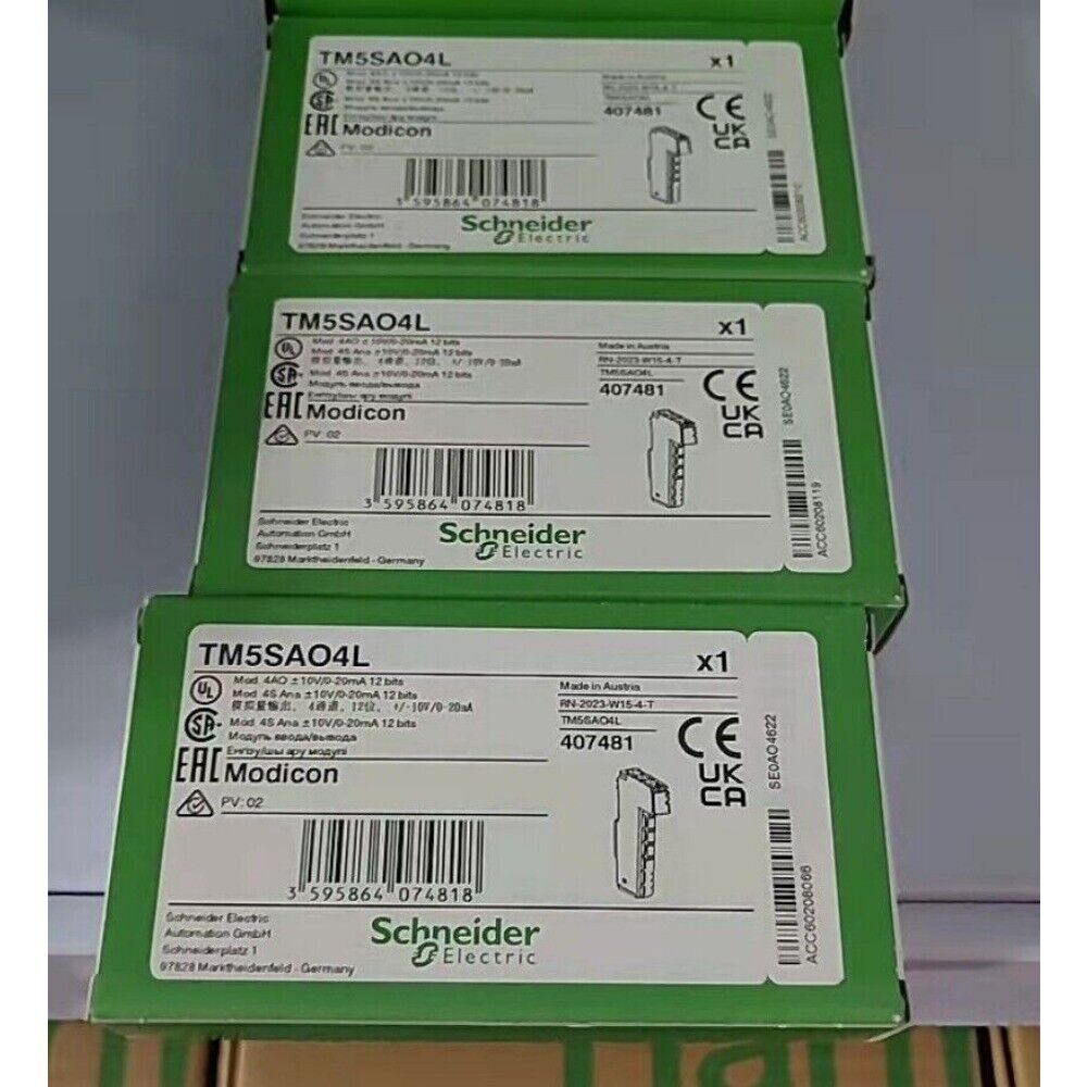 Schneider Electric TM5SAO4L analog output module boxes, green packaging, PLC component.