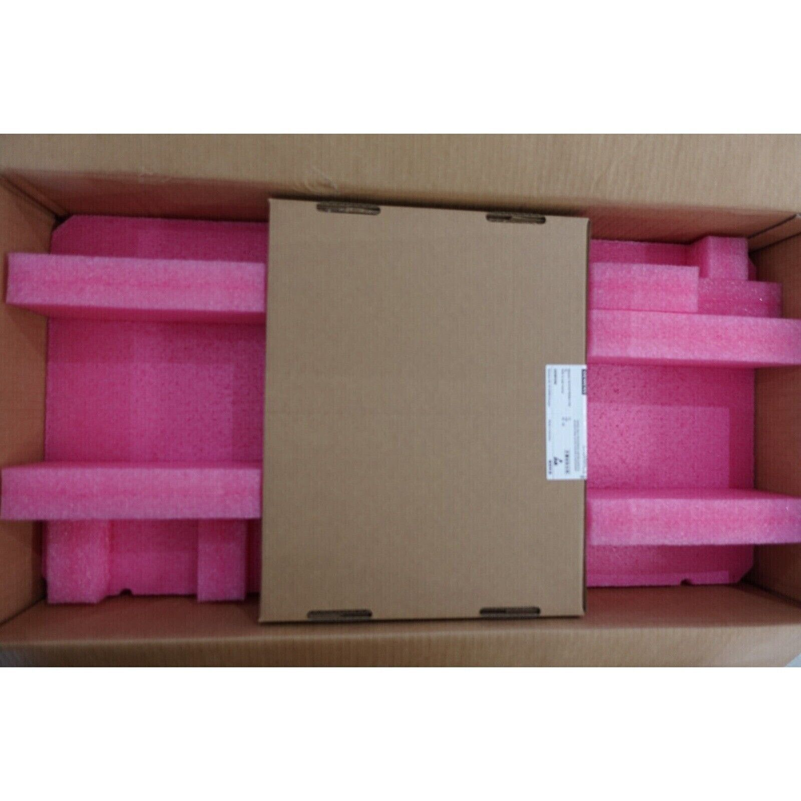 Siemens SINAMICS G120 Power Module packaging, cardboard box with pink protective foam, product ready for shipment.