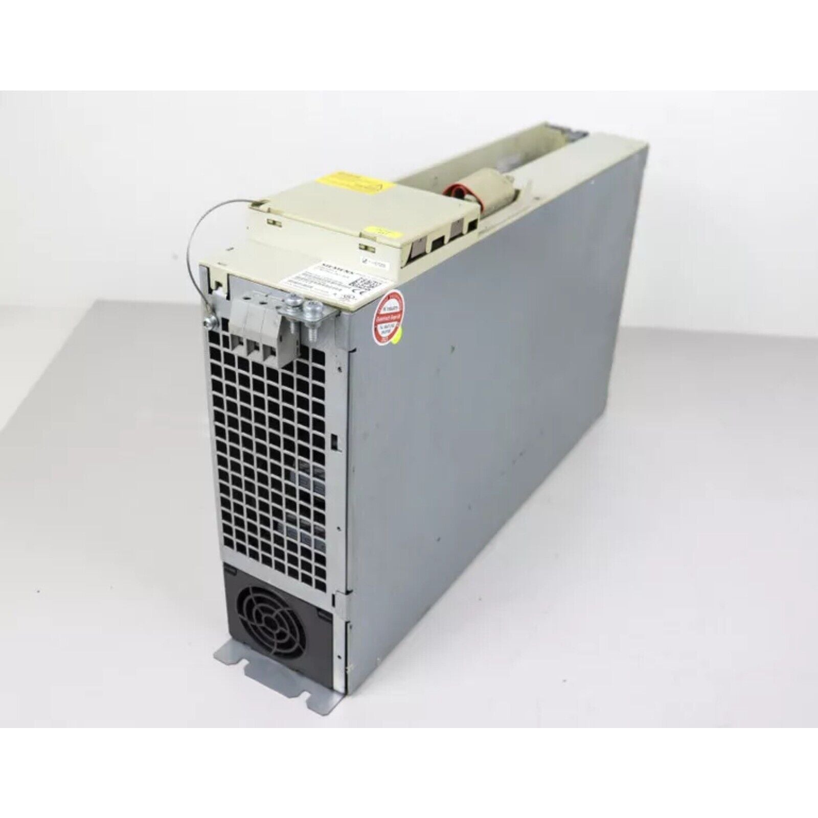 SIMODRIVE 611 power module, grey metal casing with fan. Industrial automation part for CNC machines and motion control.