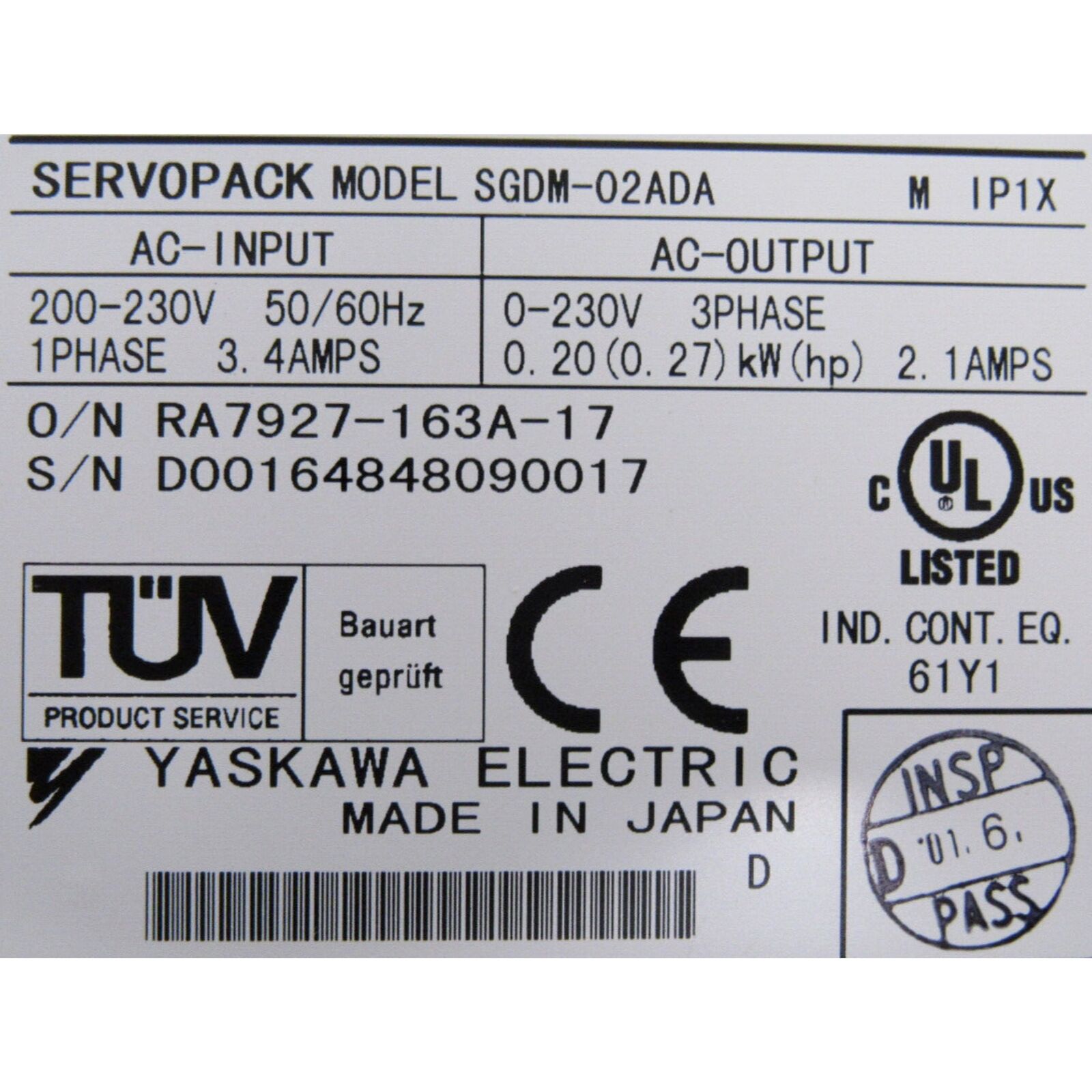YASKAWA SGDM-02ADA servo drive label with model info, voltage, and certifications like CE and UL.