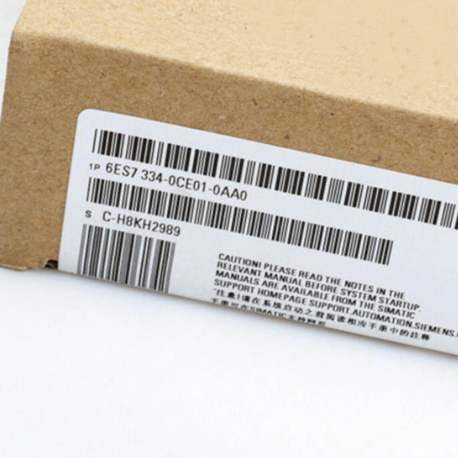 Siemens SIMATIC S7-300 6ES7334-0CE01-0AA0 module label, automation part, barcode, caution notes.