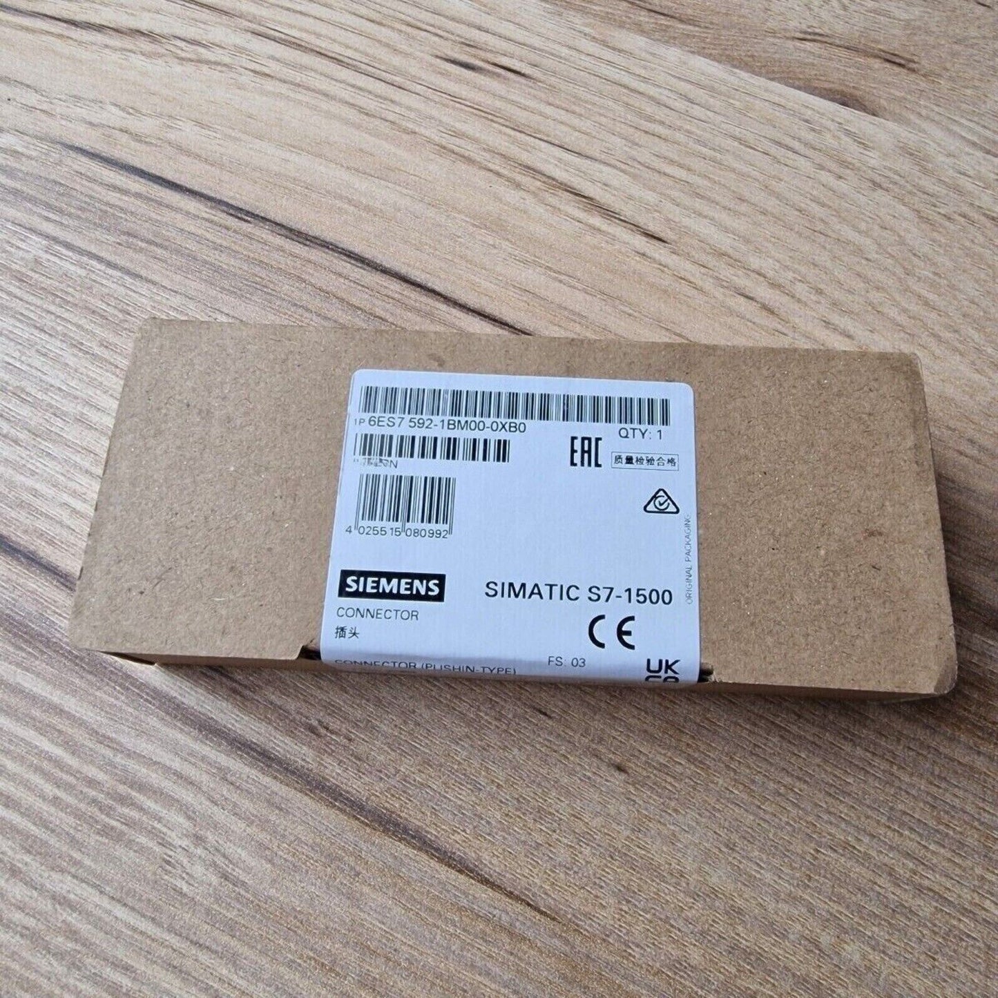 Siemens SIMATIC S7-1500 backplane bus connector in packaging, product code 6ES7592-1BM00-0XB0, CE certification.