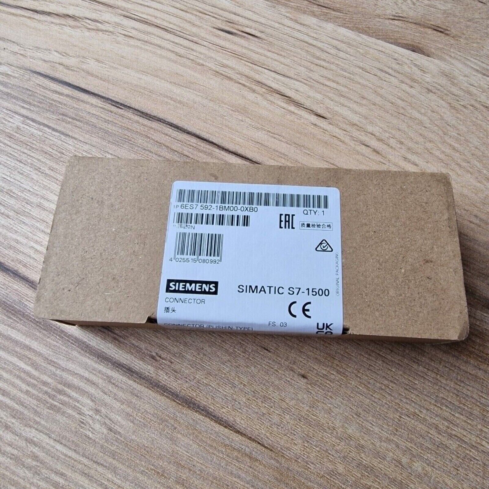 Siemens SIMATIC S7-1500 backplane bus connector in packaging, product code 6ES7592-1BM00-0XB0, CE certification.