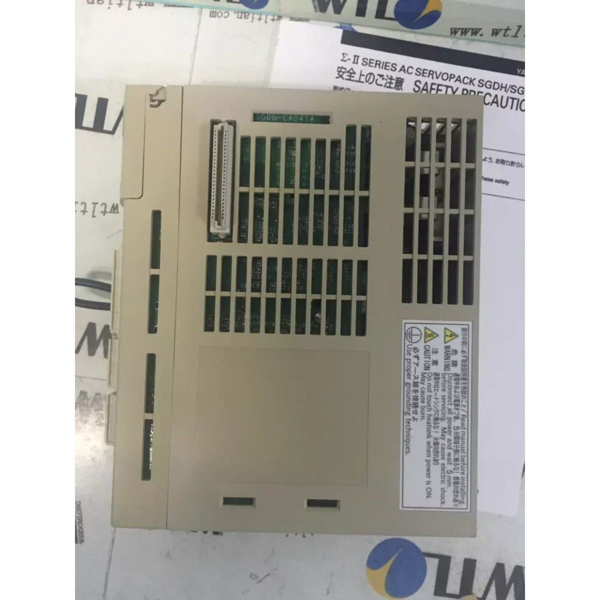 Yaskawa SGDG-CA041A Servo Drive, industrial automation part, beige with green circuit board, safety precautions