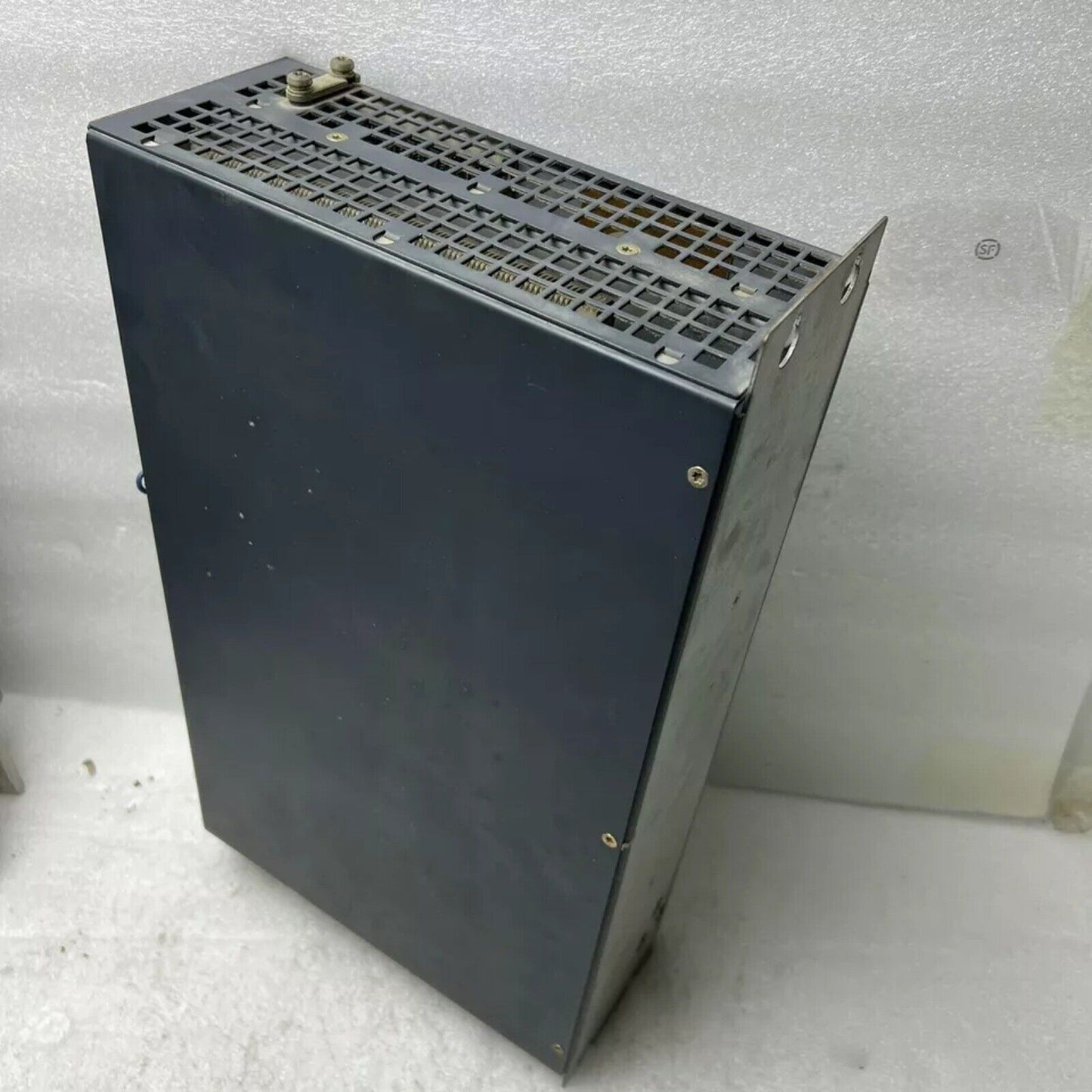 Siemens SIMODRIVE PLC module 6FC5548-0AC22-0AA0, industrial automation part in dark gray, with a mesh top.