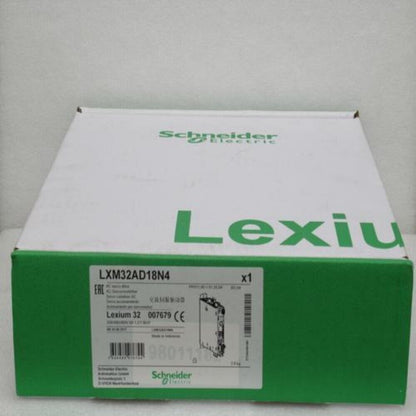 Schneider Electric Lexium LXM32AD18N4 PLC Module in green box, industrial automation part.