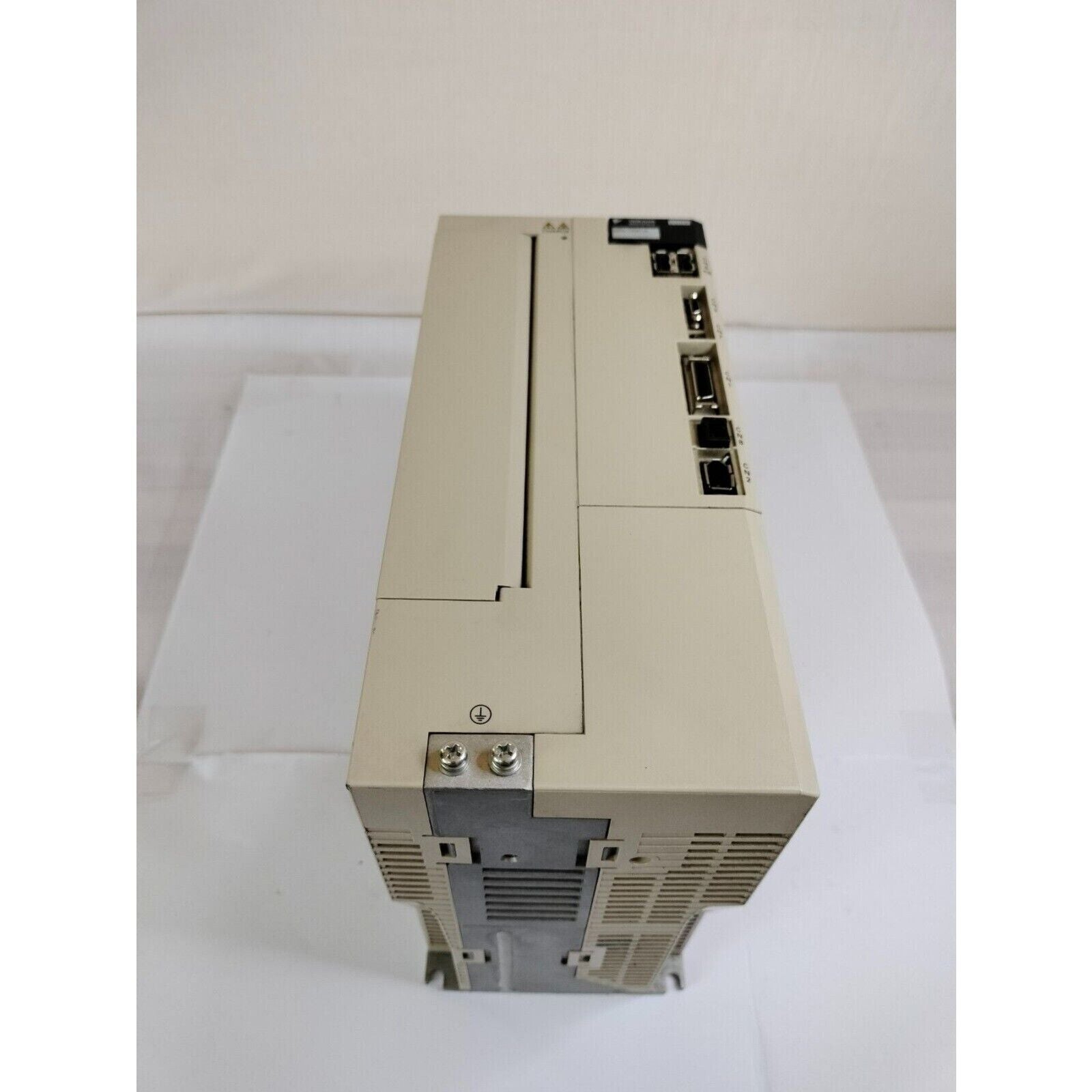 YASKAWA SGDV-330A11A Servopack Servo Drive, beige industrial control module.Side view.