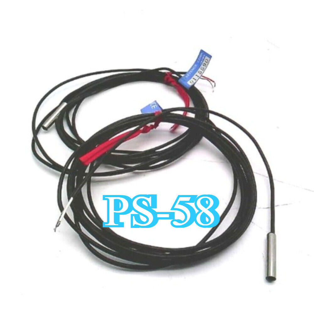 Keyence PS-58 Sensor. Industrial automation sensor with black cable.