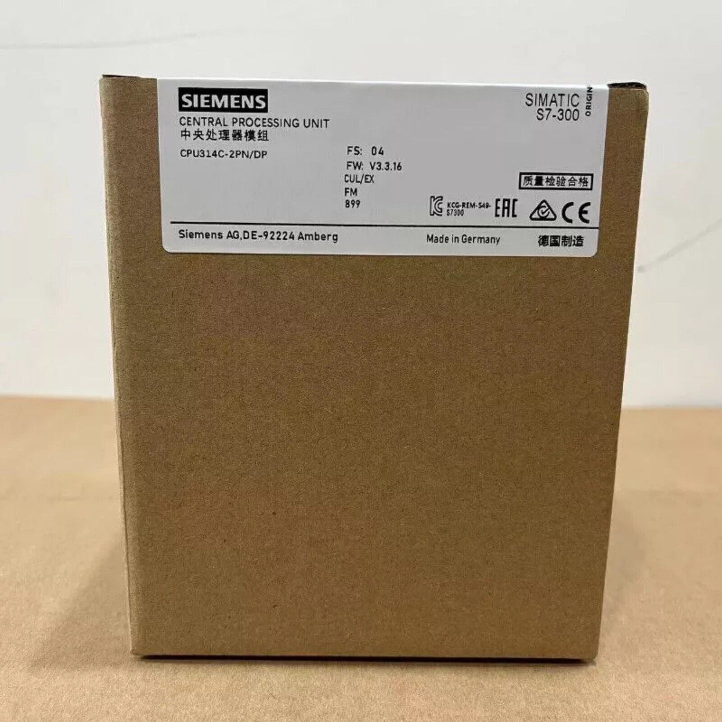 Siemens S7-300 CPU in a brown box, product detail for automation parts.
