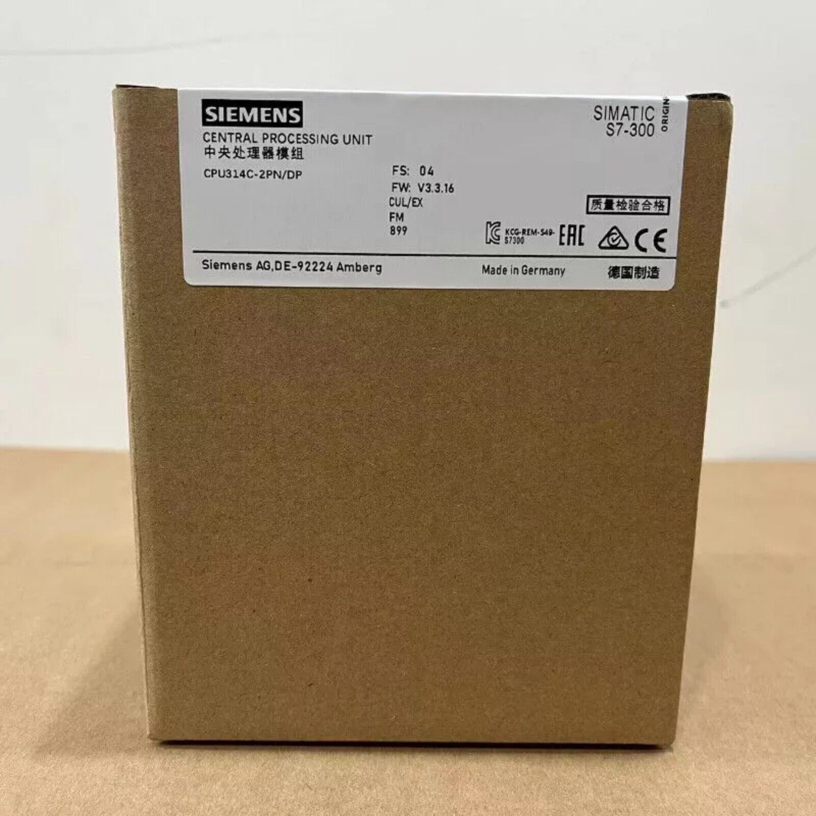 Siemens S7-300 CPU in a brown box, product detail for automation parts.