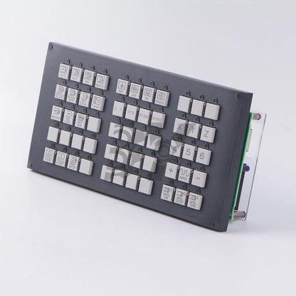 FANUC A02B-0303-C231 operation panel key with multiple function buttons for industrial automation control.