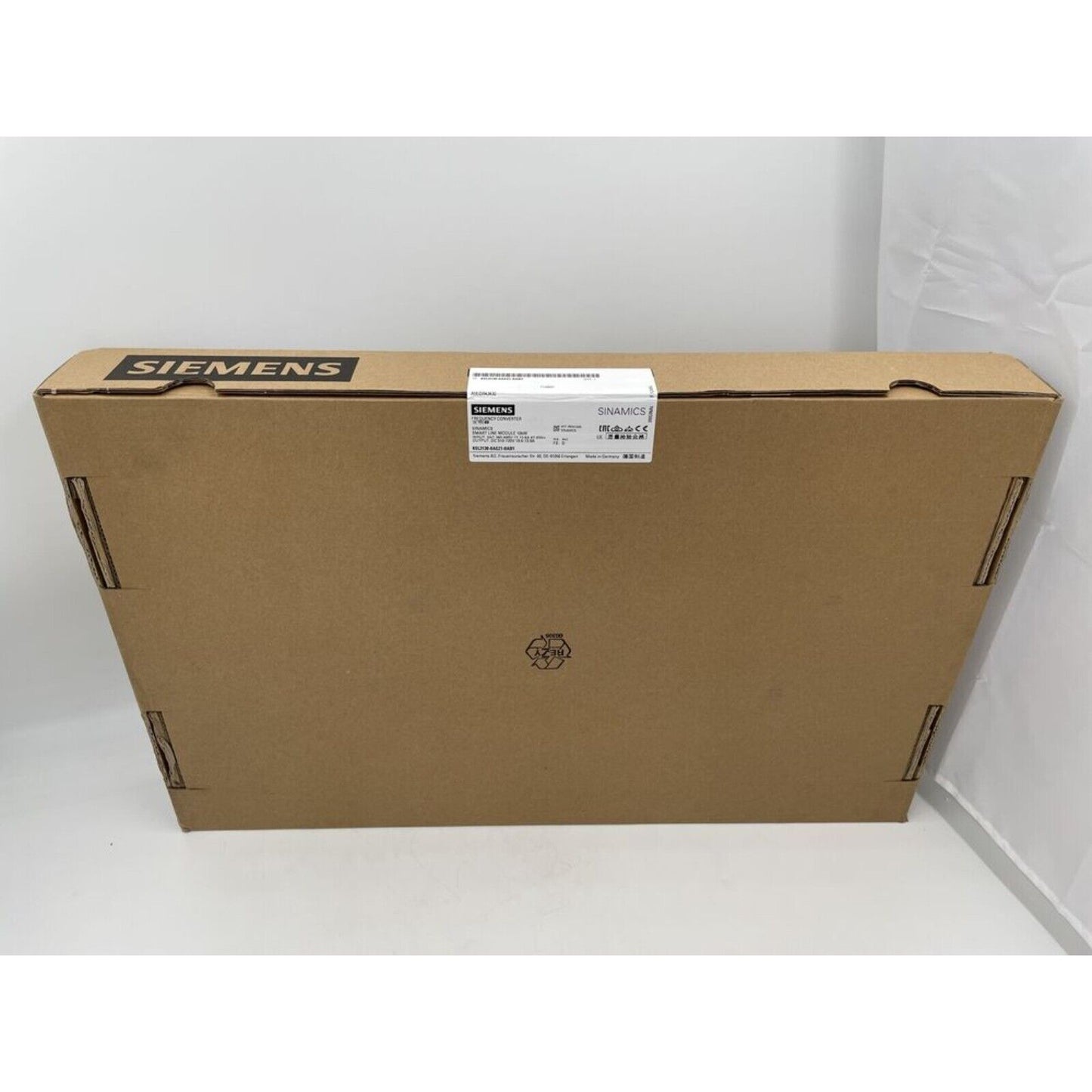 Siemens SINAMICS product box. Industrial automation part packaging.