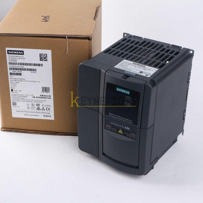 Siemens MICROMASTER 420 frequency inverter. Gray and black industrial automation part. Includes product label.