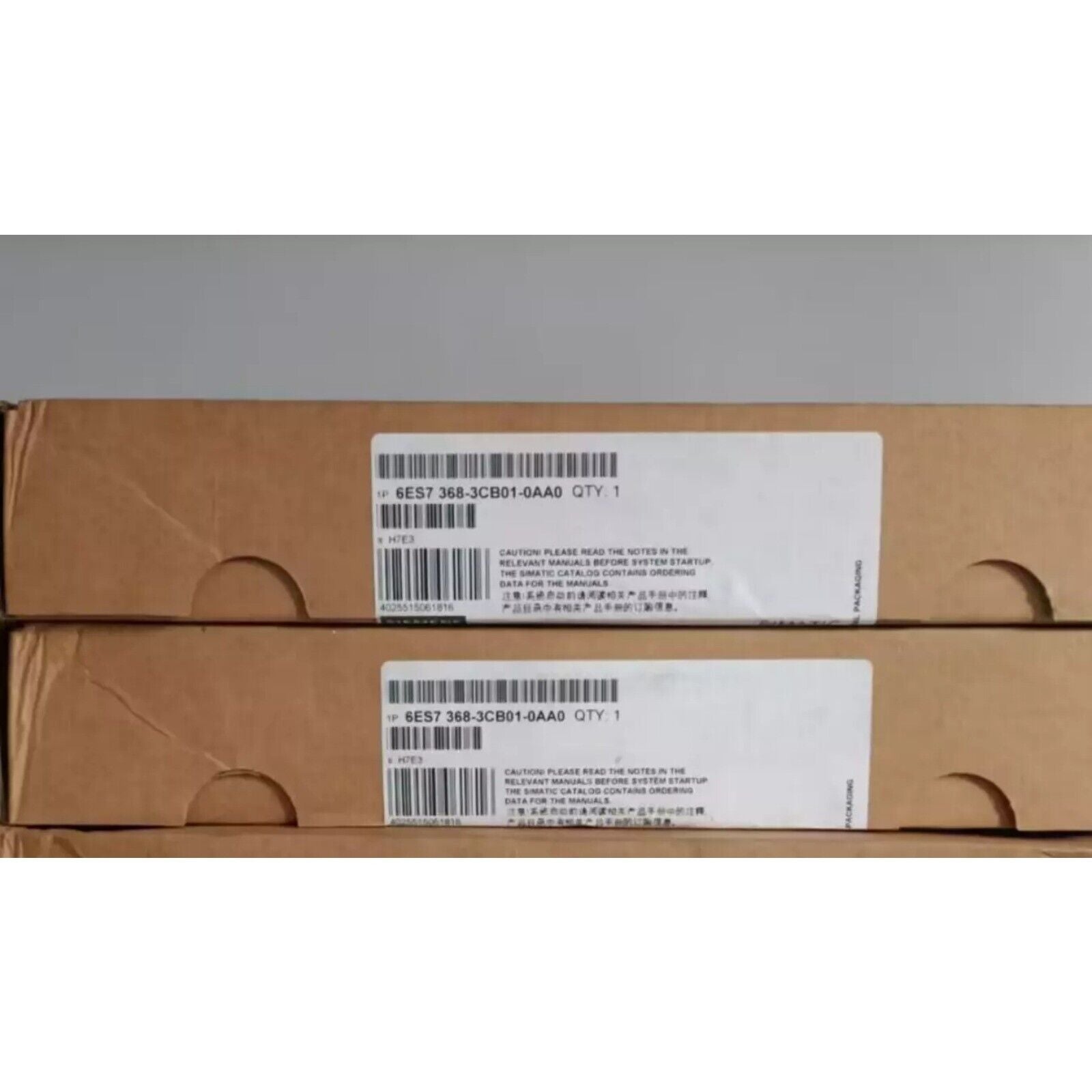 Siemens S7-300 PLC cable packaging boxes, product label visible. Model 6ES7 368-3CB01-0AA0.