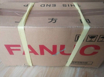 FANUC A06B-2202-B805 servo motor box packaging with straps, industrial automation part