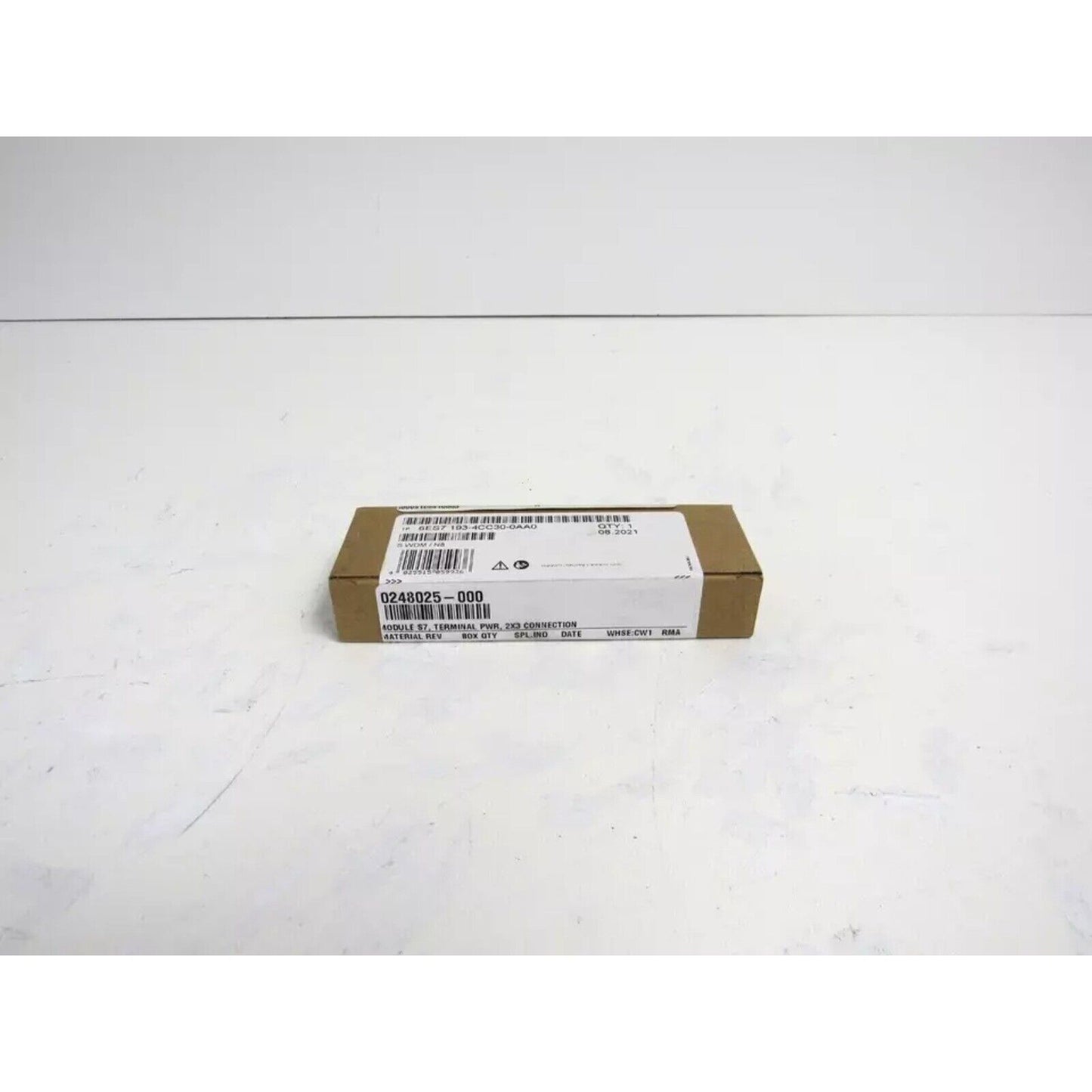 Siemens Terminal Module 6ES7193-4CC30-0AA0. Product packaging showing model number and specifications. Brown cardboard box.