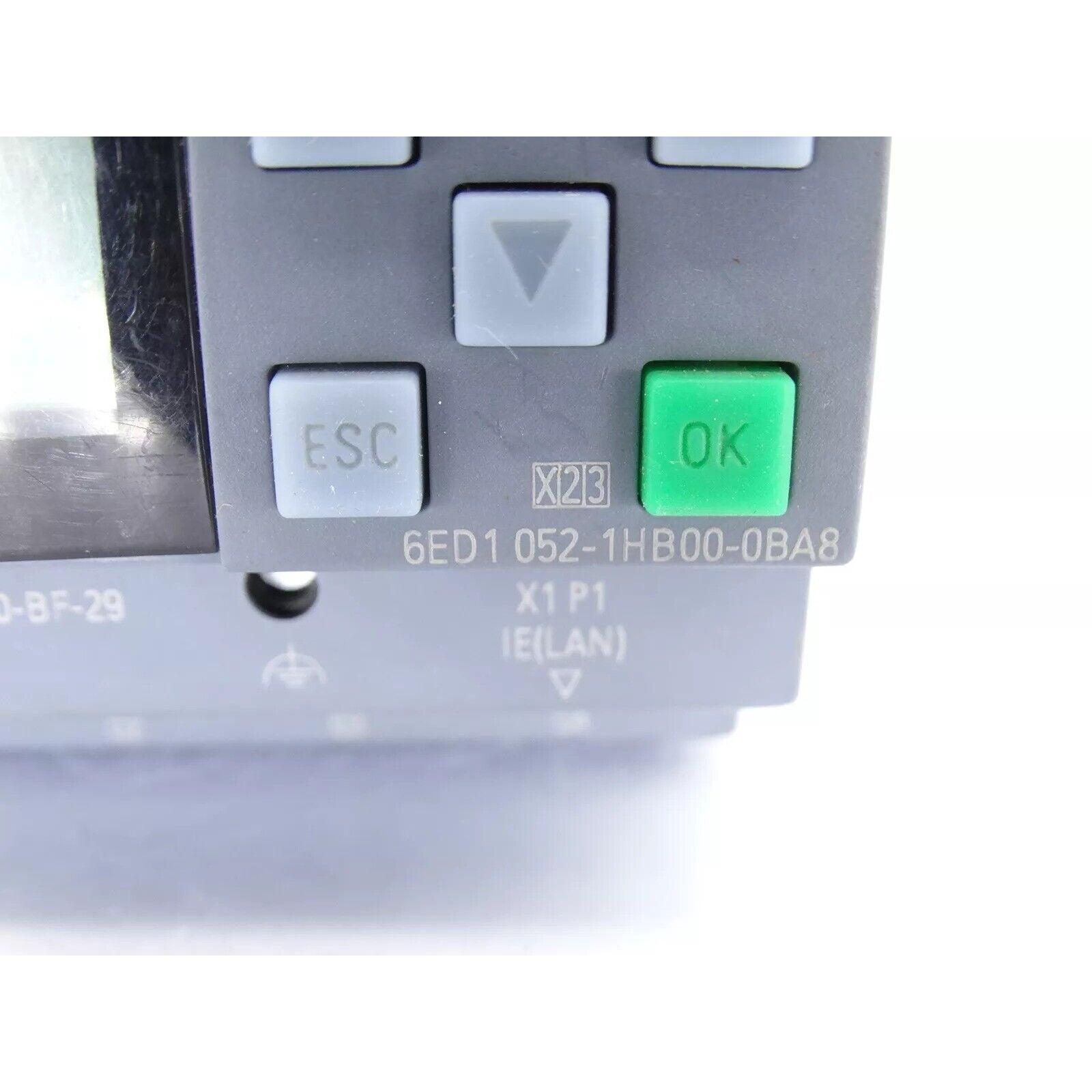 Siemens LOGO! 24RCE Logic Module detail, showing buttons 'ESC' and 'OK', with model number 6ED1 052-1HB00-0BA8.