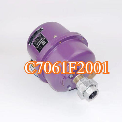 Honeywell C7061F2001 UV Flame Detector, purple housing with silver fittings, industrial automation part.