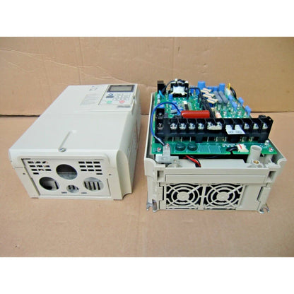 YASKAWA E7 AC drive, white casing with control panel and internal components, industrial automation part CIMR-E7U47P5