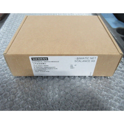 Siemens SCALANCE XB005 Industrial Ethernet Switch in a brown cardboard box, IP20 rated.