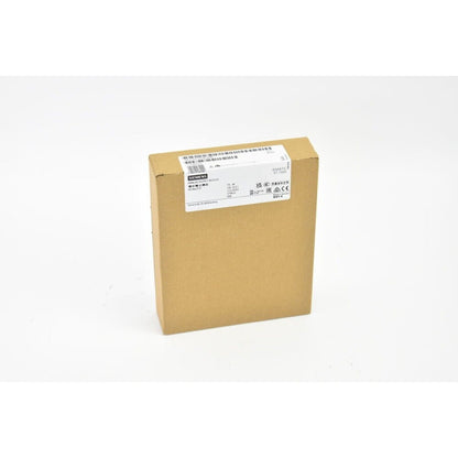 Siemens SIMATIC S7-1500 analog output module in brown cardboard box, industrial automation part.