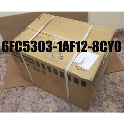 Siemens 6FC5303-1AF12-8CY0 PLC button panel box, industrial automation part in brown cardboard.