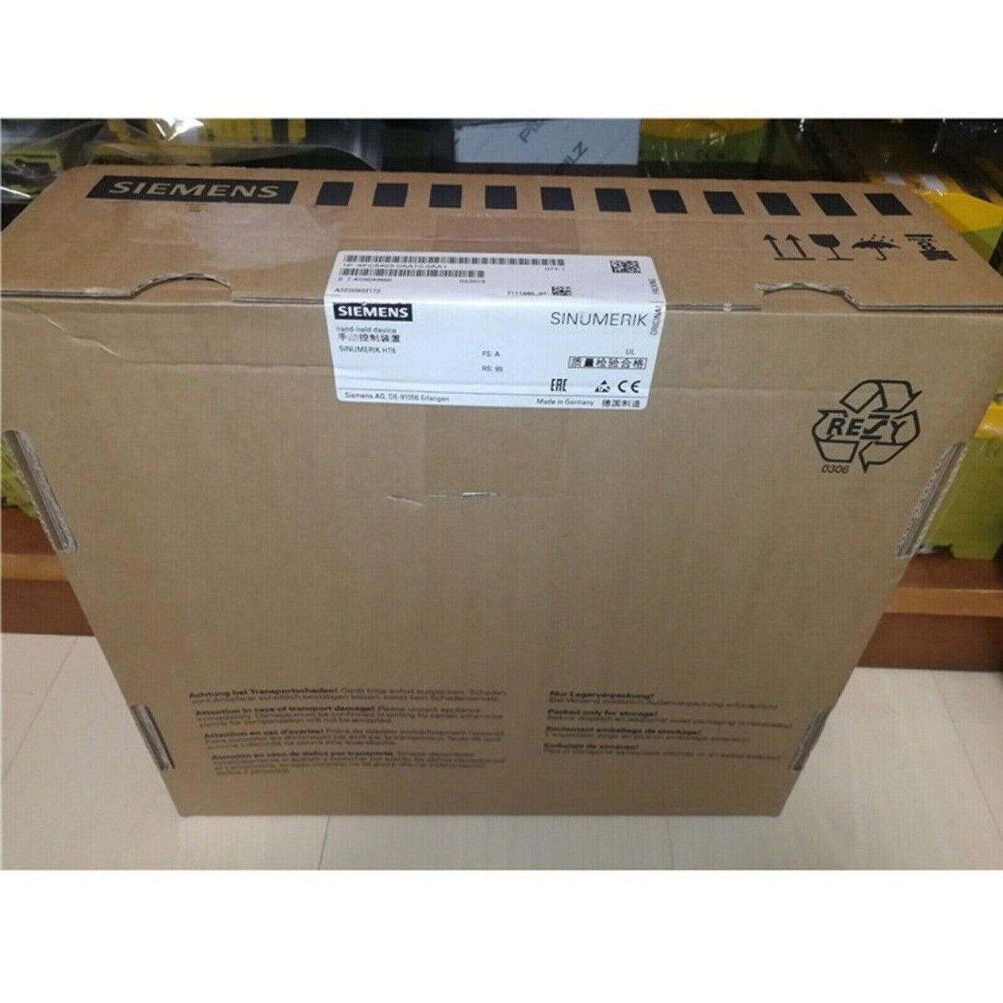 Siemens SINUMERIK handheld device shipping box, industrial automation part, Made in Germany, quality control certified