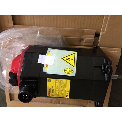 FANUC A06B-0227-B000 Servo Motor, black industrial automation part, new in box,  with labels.