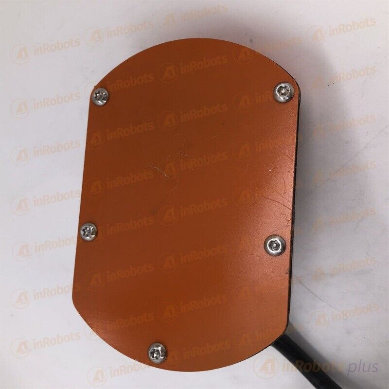 ABB IRB2400 robot body component. Orange metal plate with mounting screws and cables, industrial automation part.