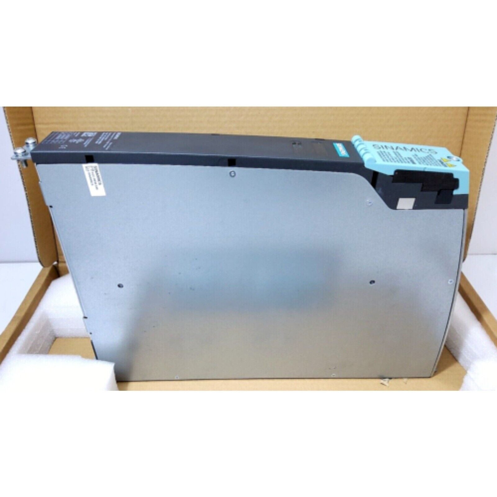 Siemens SINAMICS drive component in box. Industrial automation PLC part. SINAMICS product.
