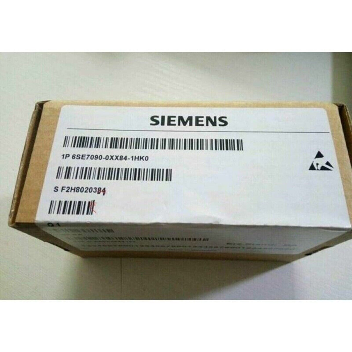 Siemens 6SE7090-0XX84-1HK0 SIMOVERT Master Drives module box, product packaging, bar codes visible.