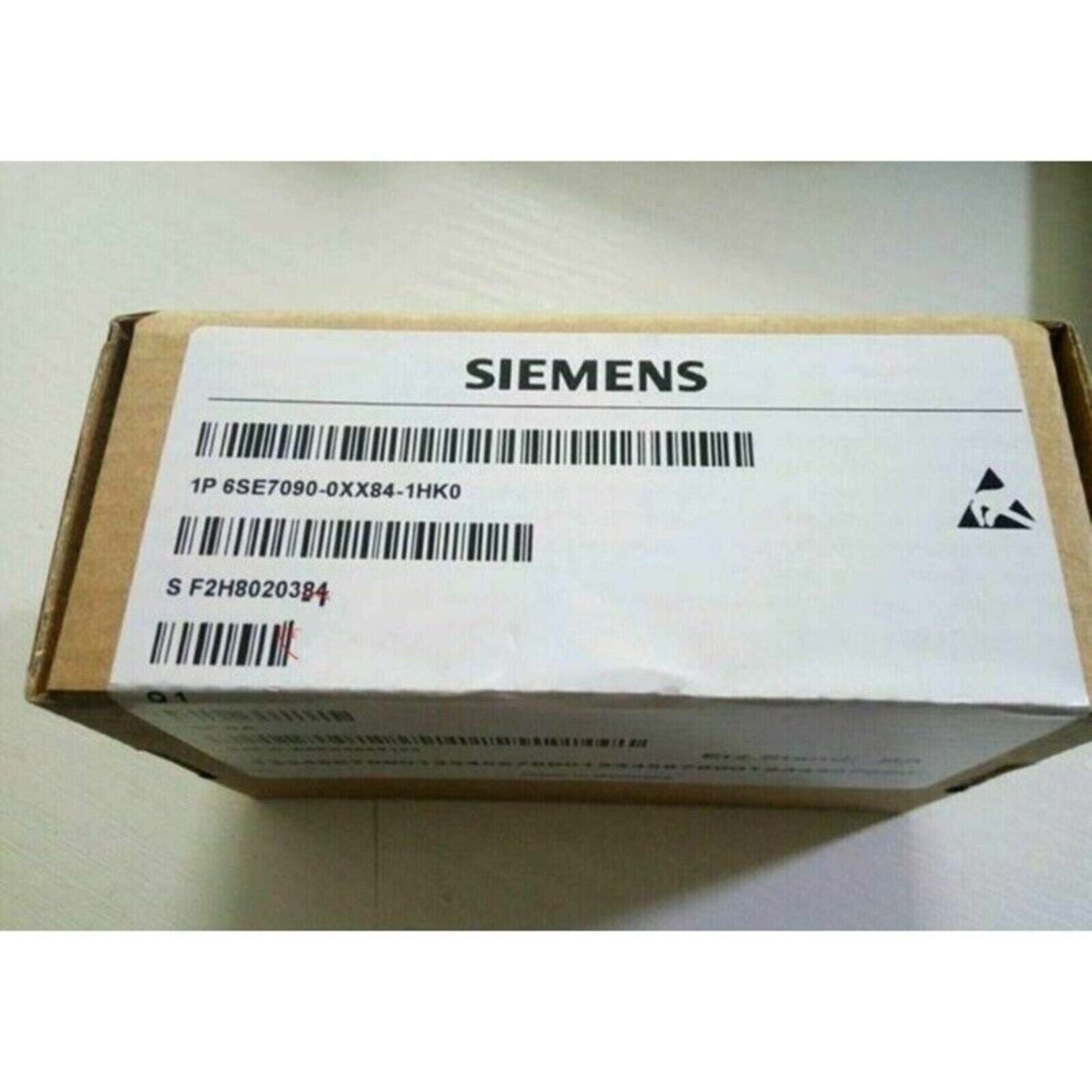 Siemens 6SE7090-0XX84-1HK0 SIMOVERT Master Drives module box, product packaging, bar codes visible.