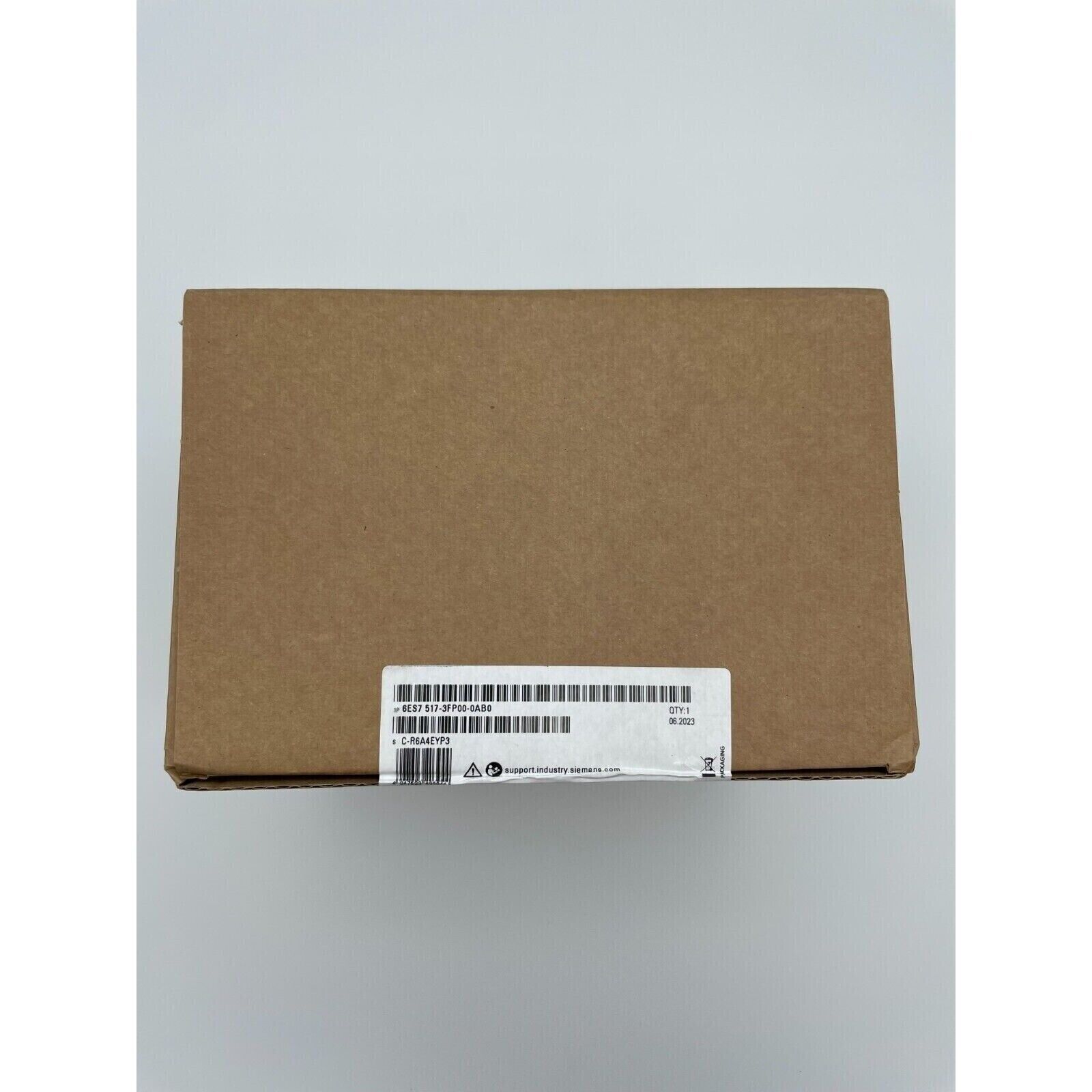 Siemens 6ES7517-3FP00-0AB0 PLC module in cardboard box, industrial automation part