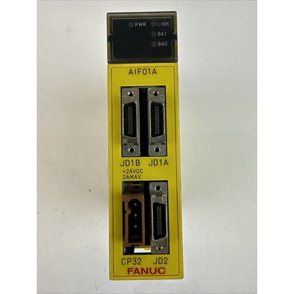 FANUC A03B-0819-C011 I/O Interface Module AIF01A. Industrial automation part in yellow with multiple ports and labels.